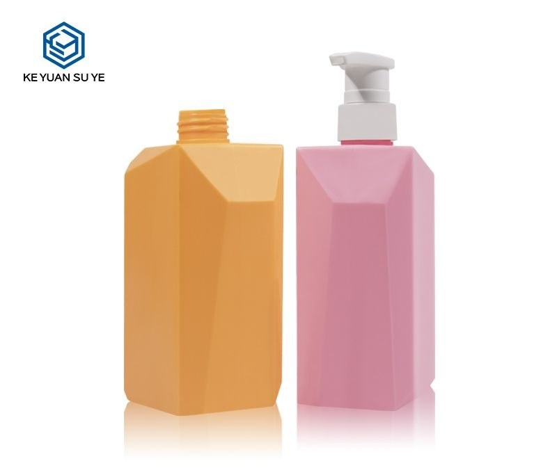 KY185 - Chai dầu gội nhựa 550ml màu hồng kèm vòi bơm