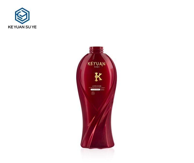 KY224 - Chai nhua PET 600ml mau do dung dau goi, kem voi bom lotion trang